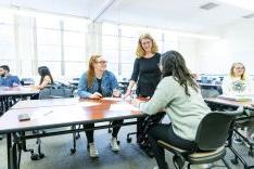 Benerd College faculty with students in classroom