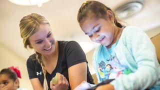 student with child patient