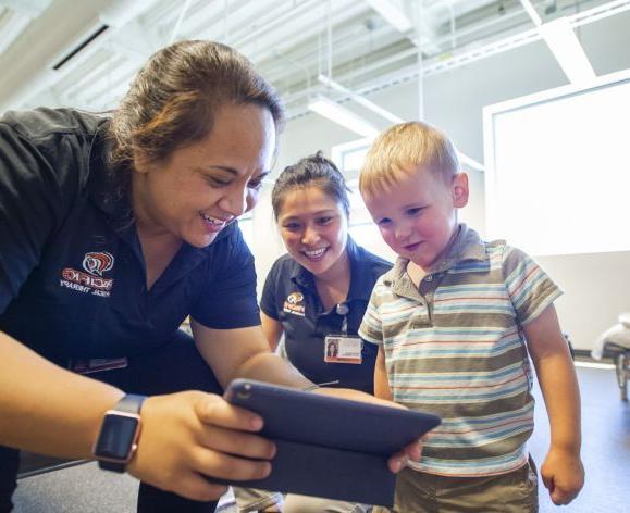 PT student working with child in clinic